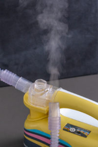 personal steam inhaler with lots of steam used to make smoke in a food photography shoot. photo tip